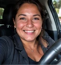 AI-generated illustration of a smiling adult seated in a car